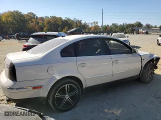 2004 Volkswagen Passat Sedan GLX with VIN WVWTH63B64P253228, listed as a Copart auction lot 77335744 with 160,018 mi miles and Salvage Title. Bid and sale history available at carsss.com. Image 3.
