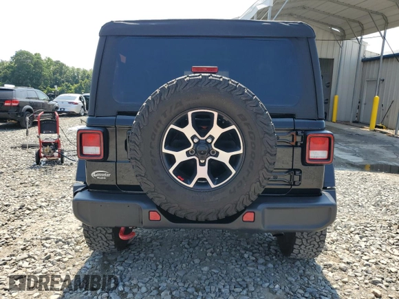 2022 Jeep Wrangler Rubicon with VIN 1C4HJXCG9NW197322, listed as a Copart auction lot 59984775 with 35,374 mi miles and Salvage title. Bid and sale history available at DreamBid. Image 6.