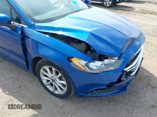 2017 Ford Fusion SE z VIN 3FA6P0H78HR195208, wystawiony jako IAAI lot #40384232 z przebiegiem 166 927 mil mil oraz . Historia ofert i sprzedaży dostępna na DreamBid. Obrazek 6.