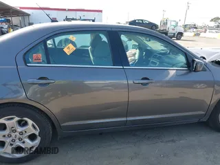 2011 Ford Fusion SE with VIN 3FAHP0HA7BR319917, listed as a IAAI auction lot 41845471 with 115,071 mi miles. Bid and sale history available at carsss.com. Image 13.