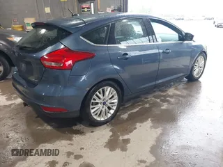 2018 Ford Focus Titanium with VIN 1FADP3N29JL242428, listed as a IAAI auction lot 42323967 with 200,662 mi miles and . Bid and sale history available at DreamBid. Image 4.