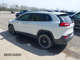 2015 Jeep Cherokee Latitude with VIN 1C4PJLCS3FW670254, listed as a IAAI auction lot 42060659 with 164,291 mi miles. Bid and sale history available at carsss.com. Image 3.