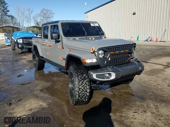 2022 Jeep Gladiator Willys with VIN 1C6HJTAG7NL117102, listed as a Copart auction lot 87679075 with 28,196 mi miles and Salvage title. Bid and sale history available at DreamBid. Image 13.