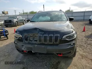 2022 Jeep Cherokee Trailhawk with VIN 1C4PJMBX8ND554044, listed as a Copart auction lot 82687464 with 13,353 mi miles and Salvage Title. Bid and sale history available at carsss.com. Image 11.