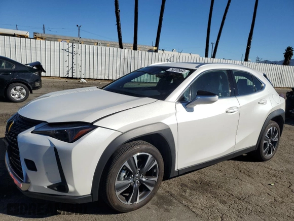 2024 Lexus UX with VIN JTHX6JBH0R2188086, listed as a Copart auction lot 79203964 with 7,703 mi miles and Salvage Title. Bid and sale history available at carsss.com. Image 1.