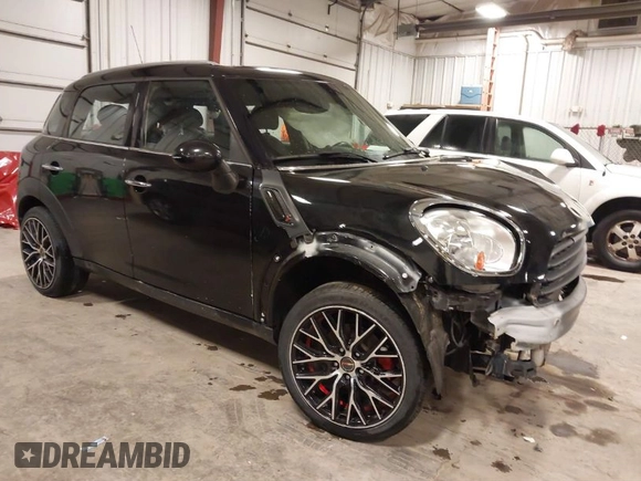 2012 MINI Countryman with VIN WMWZB3C53CWM05133, listed as a IAAI auction lot 41493309 with 114,412 mi miles and . Bid and sale history available at DreamBid. Image 1.