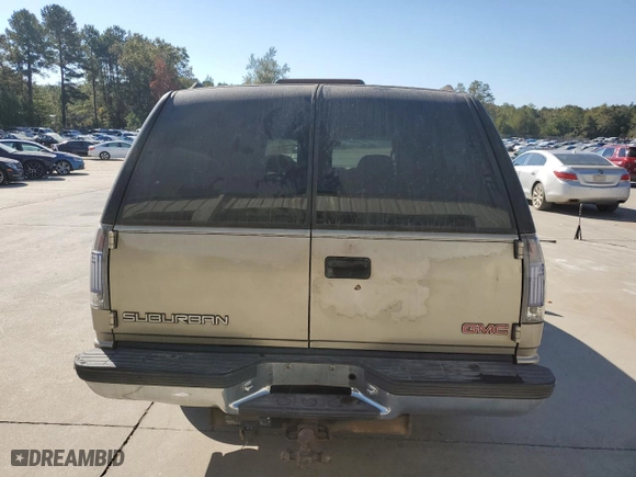 1999 GMC Suburban with VIN 3GKEC16R7XG542862, listed as a Copart auction lot 77568734 with 251,717 mi miles and Salvage Title. Bid and sale history available at carsss.com. Image 6.