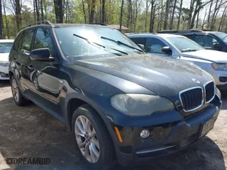 2007 BMW X5 3.0si with VIN 4USFE43597LY80810, listed as a IAAI auction lot 41940471 with 217,754 mi miles. Bid and sale history available at carsss.com. Image 1.