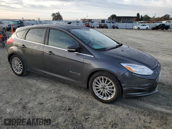 2015 Ford Focus Electric with VIN 1FADP3R43FL221870, listed as a Copart auction lot 79549284 with 67,079 mi miles and Salvage title. Bid and sale history available at DreamBid. Image 4.