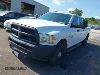 2014 Ram 2500 Tradesman with VIN 3C6TR4HT8EG120941, listed as a IAAI auction lot 42455945 with 101,726 mi miles and . Bid and sale history available at DreamBid. Image 2.