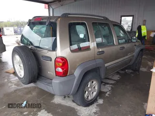2003 Jeep Liberty Sport with VIN 1J4GK48K13W633818, listed as a IAAI auction lot 41962552 with 217,884 mi miles and . Bid and sale history available at DreamBid. Image 4.