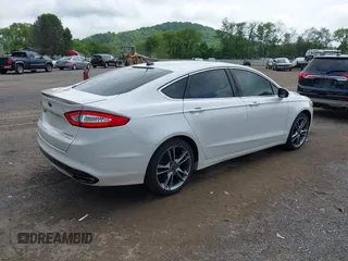 2014 Ford Fusion Titanium с VIN 3FA6P0K97ER352345, выставлен на аукционе IAAI как лот 42370970 с пробегом 182 895 миль миль и . История ставок и продаж доступна на DreamBid. Изображение 4.