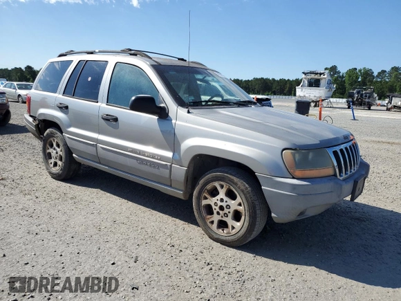 2000 Jeep Grand Cherokee Laredo with VIN 1J4G248S7YC321298, listed as a Copart auction lot 58036255 with 292,779 mi miles and Salvage title. Bid and sale history available at DreamBid. Image 4.