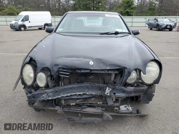 2001 Mercedes-Benz E-Class AWD with VIN WDBJF82J91X060969, listed as a Copart auction lot 71986544 with 113,694 mi miles and Salvage Title. Bid and sale history available at carsss.com. Image 5.