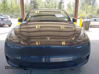 2024 Tesla Model Y Long Range z VIN 7SAYGAEE8RF088791, wystawiony jako IAAI lot #42185399 z przebiegiem 15 339 mil mil oraz . Historia ofert i sprzedaży dostępna na DreamBid. Obrazek 12.