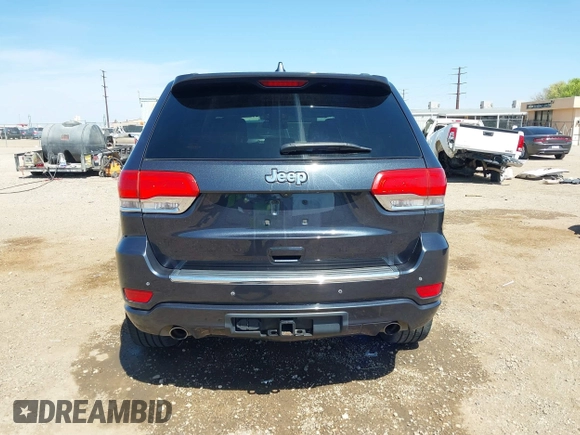 2015 Jeep Grand Cherokee Overland with VIN 1C4RJECG3FC635327, listed as a IAAI auction lot 41910559 with 118,519 mi miles and . Bid and sale history available at DreamBid. Image 16.