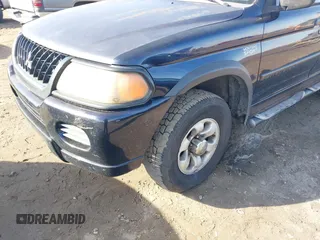 2002 Mitsubishi Montero Sport ES with VIN JA4LS21H72J054989, listed as a IAAI auction lot 41067504 with 335,479 mi miles. Bid and sale history available at carsss.com. Image 6.