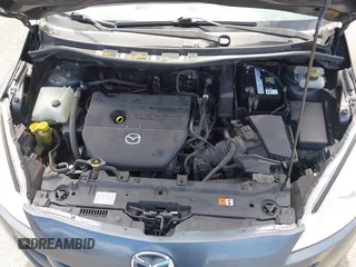 2012 Mazda 5 Grand Touring with VIN JM1CW2DL0C0139982, listed as a IAAI auction lot 42703430 with 129,763 mi miles and . Bid and sale history available at DreamBid. Image 10.
