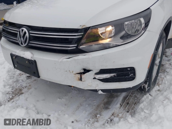 2016 Volkswagen Tiguan S with VIN WVGBV7AX2GW550558, listed as a IAAI auction lot 41553304 with 100,864 mi miles and . Bid and sale history available at DreamBid. Image 6.