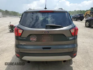 2019 Ford Escape Titanium с VIN 1FMCU9J9XKUA39544, выставлен на аукционе Copart как лот 62363005 с пробегом 80 831 миль миль и Списание • Salvage title. История ставок и продаж доступна на DreamBid. Изображение 6.
