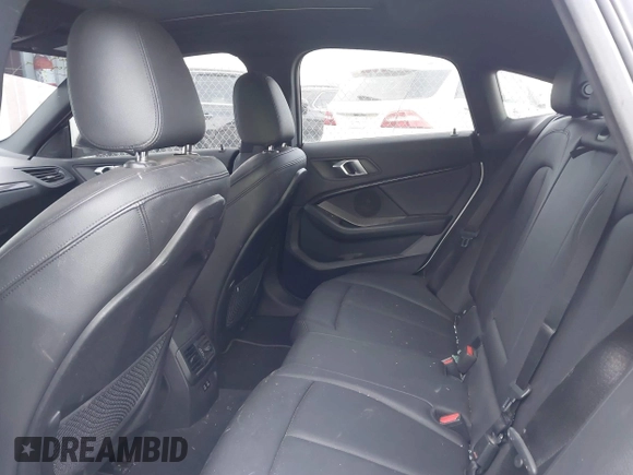 2021 BMW 2 Series 228i xDrive with VIN WBA73AK07M7H56978, listed as a IAAI auction lot 41215710 with 77,965 mi miles and . Bid and sale history available at DreamBid. Image 7.