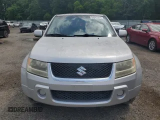 2006 Suzuki Grand Vitara z VIN JS3TE941764101657, wystawiony jako Copart lot #54943205 z przebiegiem 206 744 mil mil oraz Szkody całkowita. Historia ofert i sprzedaży dostępna na DreamBid. Obrazek 5.