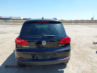 2015 Volkswagen Tiguan SE with VIN WVGAV7AX1FW558855, listed as a IAAI auction lot 42064427 with 58,584 mi miles and . Bid and sale history available at DreamBid. Image 16.