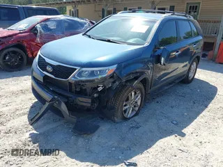 2014 Kia Sorento LX with VIN 5XYKT3A65EG474225, listed as a IAAI auction lot 42059313 with 190,803 mi miles and . Bid and sale history available at DreamBid. Image 6.