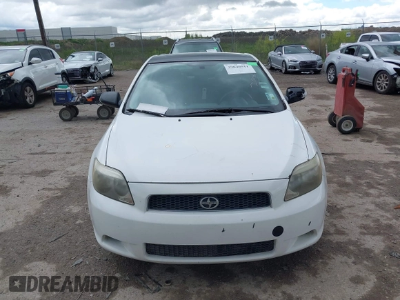 2005 Scion tC with VIN JTKDE177750015400, listed as a IAAI auction lot 39040511 with 232,749 mi miles. Bid and sale history available at carsss.com. Image 13.
