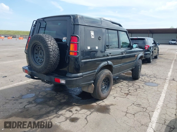 2004 Land Rover Discovery SE with VIN SALTW19464A860565, listed as a IAAI auction lot 42019860 with 153,274 mi miles. Bid and sale history available at carsss.com. Image 4.