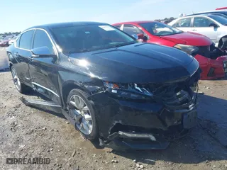 2015 Chevrolet Impala LTZ with VIN 2G1165S31F9220567, listed as a IAAI auction lot 41653330 with 211,891 mi miles. Bid and sale history available at carsss.com. Image 1.