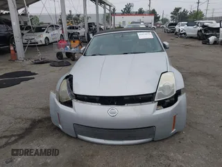 2006 Nissan 350Z Touring with VIN JN1AZ36A36M450659, listed as a IAAI auction lot 42034870 with 77,544 mi miles. Bid and sale history available at carsss.com. Image 12.
