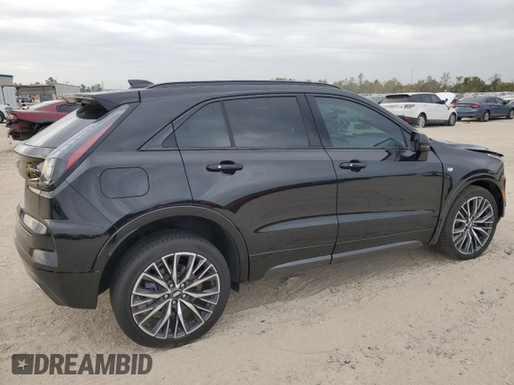 2024 Cadillac XT4 FWD Sport with VIN 1GYFZER46RF213543, listed as a Copart auction lot 83609754 with 3,878 mi miles and Salvage title. Bid and sale history available at DreamBid. Image 3.