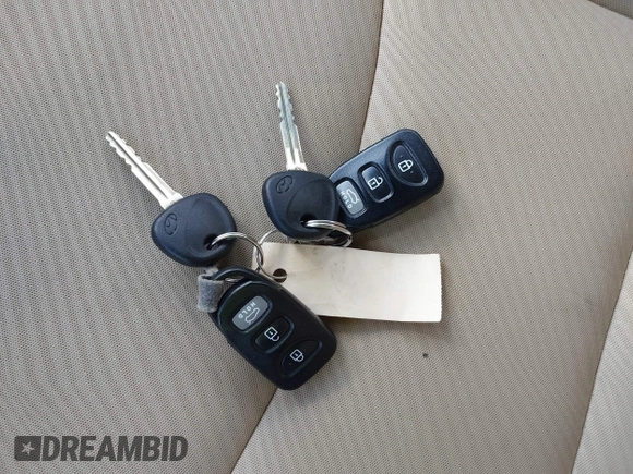 2013 Hyundai Elantra GLS with VIN 5NPDH4AE8DH329985, listed as a IAAI auction lot 42685574 with 55,906 mi miles and . Bid and sale history available at DreamBid. Image 11.