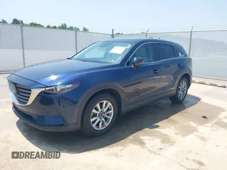 2018 Mazda CX-9 Touring with VIN JM3TCBCY3J0220372, listed as a IAAI auction lot 42405192 with 104,556 mi miles and . Bid and sale history available at DreamBid. Image 2.