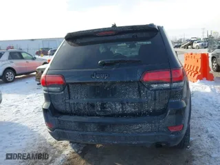 2021 Jeep Grand Cherokee Laredo X with VIN 1C4RJFAG3MC854634, listed as a IAAI auction lot 41628372 with 32,284 mi miles. Bid and sale history available at carsss.com. Image 17.