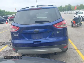 2014 Ford Escape SE z VIN 1FMCU9G94EUD88632, wystawiony jako IAAI lot #42257383 z przebiegiem 150 934 mil mil oraz . Historia ofert i sprzedaży dostępna na DreamBid. Obrazek 16.