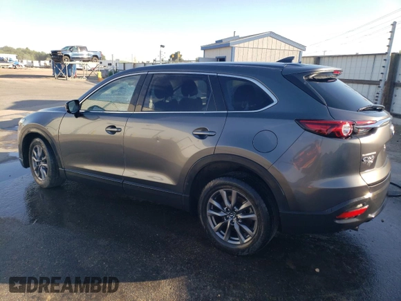 2021 Mazda CX-9 Sport with VIN JM3TCBBY5M0502888, listed as a Copart auction lot 61299673 with 50,576 mi miles and . Bid and sale history available at DreamBid. Image 2.