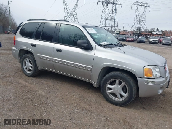 2004 GMC Envoy SLE with VIN 1GKDT13S142219365, listed as a IAAI auction lot 41612594 with 72,292 mi miles. Bid and sale history available at carsss.com. Image 1.
