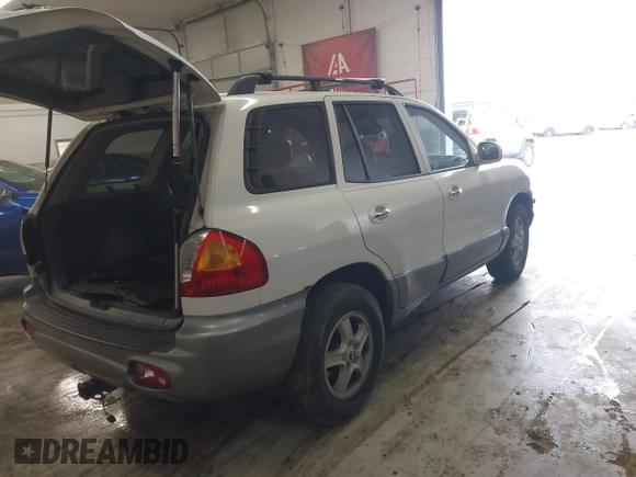2004 Hyundai Santa Fe GLS with VIN KM8SC13E44U797943, listed as a IAAI auction lot 41731356 with 184,139 mi miles. Bid and sale history available at carsss.com. Image 4.