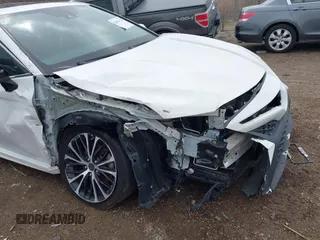 2019 Toyota Camry LE z VIN 4T1B11HK7KU687261, wystawiony jako IAAI lot #42016114 z przebiegiem 123 007 mil mil oraz . Historia ofert i sprzedaży dostępna na DreamBid. Obrazek 6.