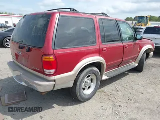 1999 Ford Explorer XLT z VIN 1FMZU35P4XUA38932, wystawiony jako IAAI lot #41953981 z przebiegiem 117 876 mil mil oraz . Historia ofert i sprzedaży dostępna na DreamBid. Obrazek 4.