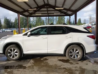 2018 Lexus RX 350L Premium z VIN JTJDZKCA5J2008427, wystawiony jako IAAI lot #41651433 z przebiegiem 51 216 mil mil oraz . Historia ofert i sprzedaży dostępna na DreamBid. Obrazek 14.