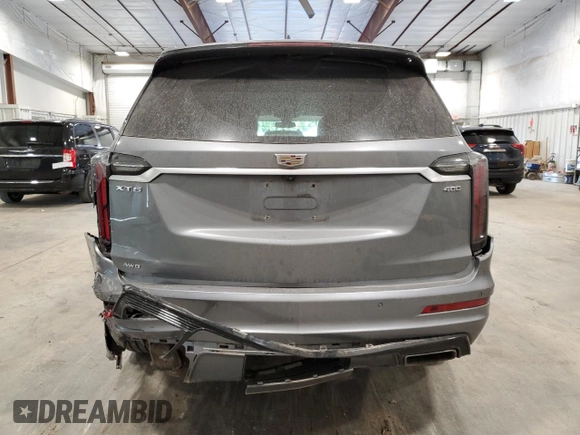 2020 Cadillac XT6 AWD Sport with VIN 1GYKPGRS5LZ145966, listed as a Copart auction lot 66585334 with 76,735 mi miles and Salvage Title. Bid and sale history available at carsss.com. Image 6.