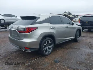 2021 Lexus RX with VIN 2T2HZMDA0MC289343, listed as a IAAI auction lot 41556887 with 42,273 mi miles. Bid and sale history available at carsss.com. Image 4.