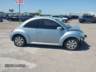 2009 Volkswagen New Beetle Coupe S with VIN 3VWPW31C59M503182, listed as a IAAI auction lot 41969191 with 61,880 mi miles. Bid and sale history available at carsss.com. Image 14.
