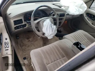 1996 Buick Regal Custom with VIN 2G4WB52K7T1426501, listed as a Copart auction lot 84858184 with 89,553 mi miles and Salvage title. Bid and sale history available at DreamBid. Image 8.