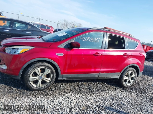 2014 Ford Escape SE with VIN 1FMCU9G90EUD71021, listed as a IAAI auction lot 42052487 with 154,811 mi miles and . Bid and sale history available at DreamBid. Image 15.