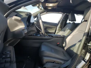 2024 Lexus UX with VIN JTHX6JBH9R2189737, listed as a Copart auction lot 77551214 with 0 mi miles and Salvage Title. Bid and sale history available at carsss.com. Image 7.