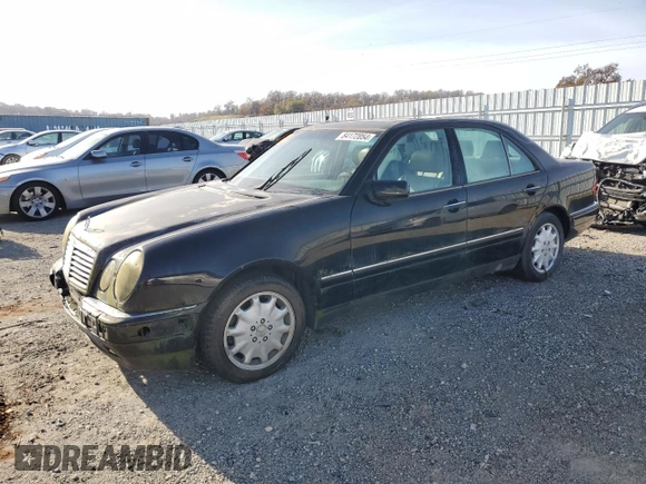 1997 Mercedes-Benz E-Class with VIN WDBJF55F5VJ028552, listed as a Copart auction lot 84172054 with 308,426 mi miles and Clean Title. Bid and sale history available at carsss.com. Image 1.